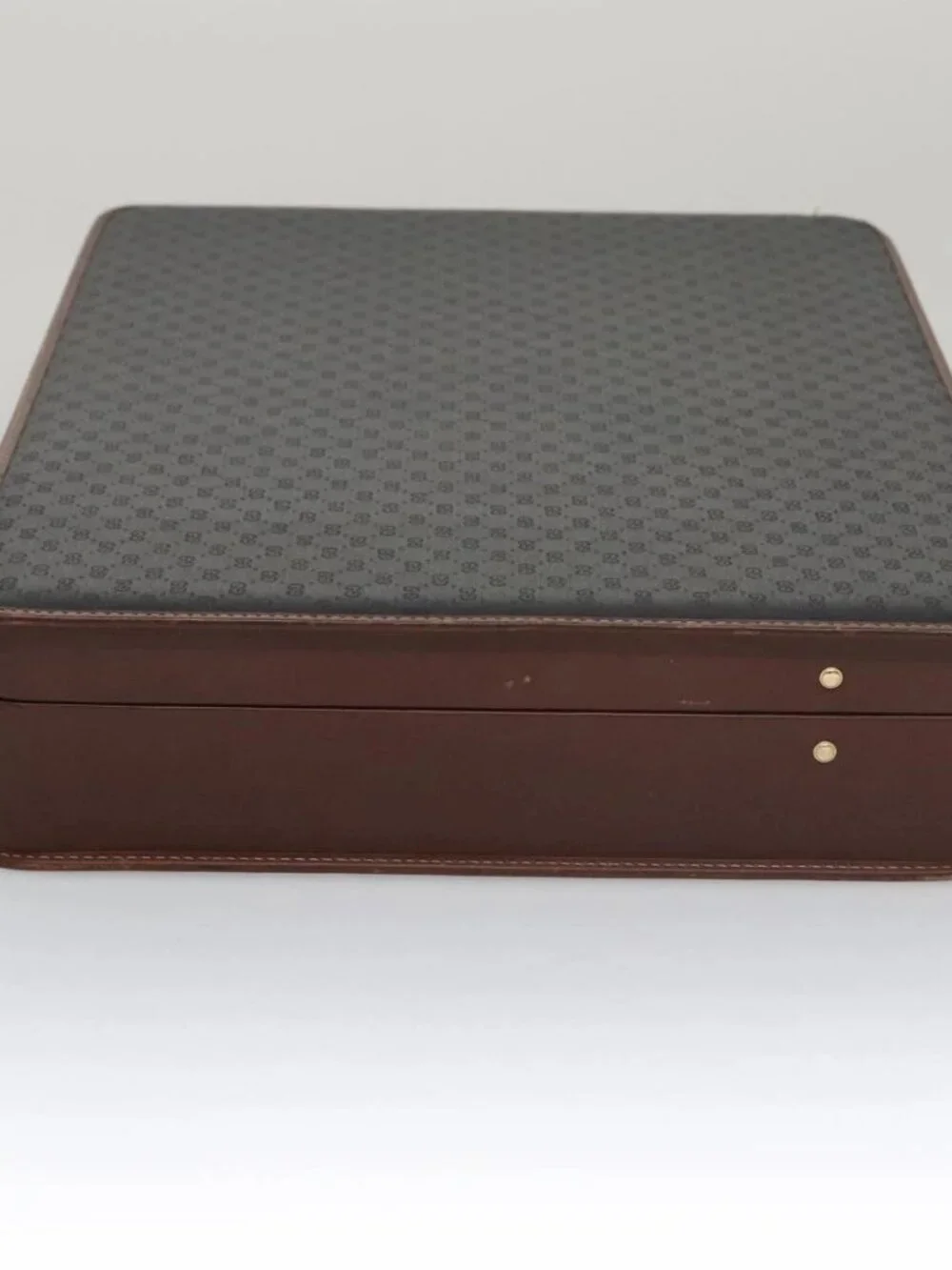 GUCCI Micro GG Canvas Trunk Black Gold